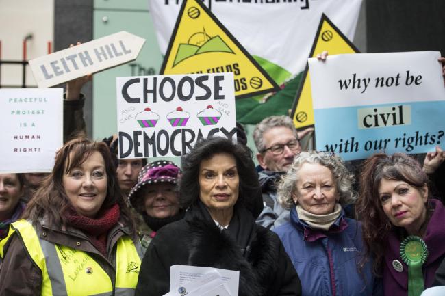 Bianca Jagger and environmental protesters outside the High Court in London (Victoria Jones/PA)