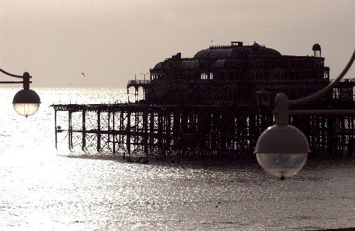 This picture, taken just a few weeks before the fire took hold, shows the pier framed by two street lamps in the late afternoon winter sun
