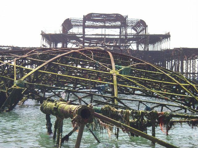  This picture of the pier at low tide by Ross Milne shows the roof of the fire-ravaged section in close-up.